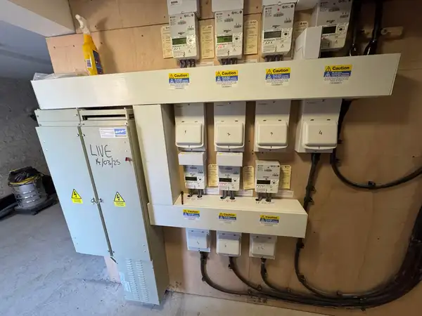 6-Flat Block — Power Upgrade and Meter Relocation